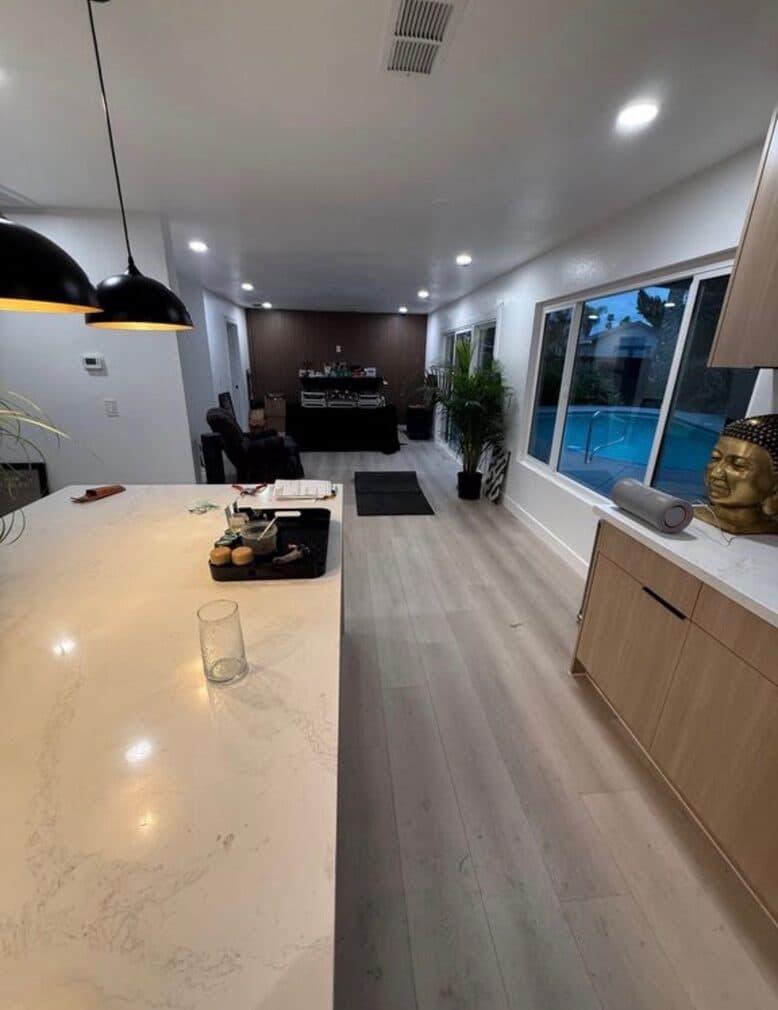 Open-plan kitchen with pool view